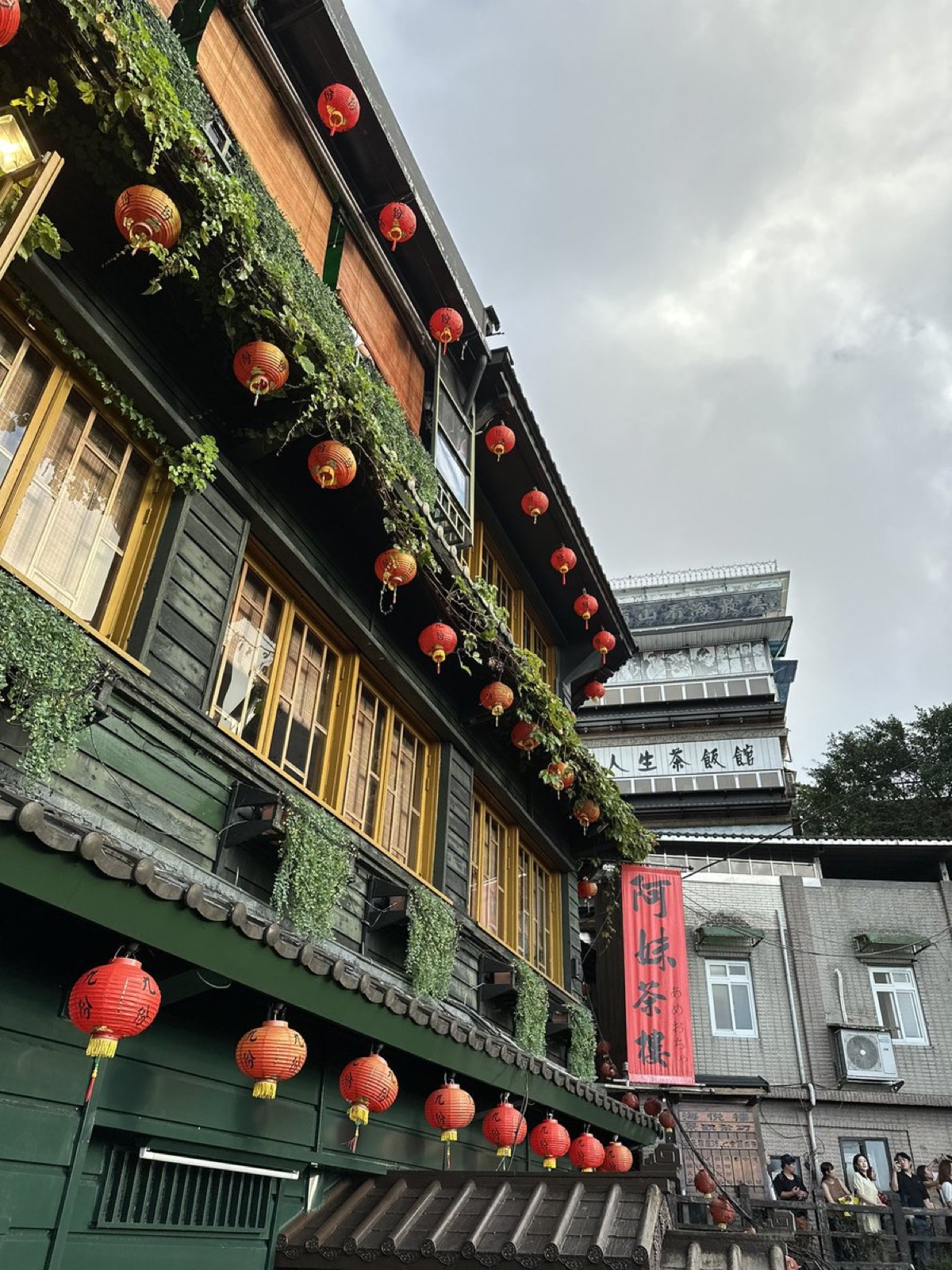 A traditional wooden teahouse in Jiufen, Taiwan, hung with red lanterns